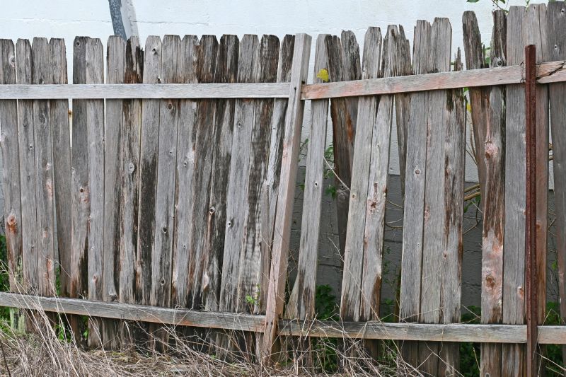 Leaning Fence Repair